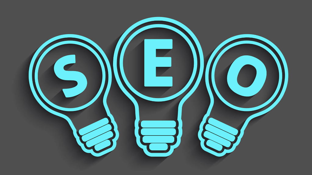 SEO strategy concept shown with lightbulbs representing search engine optimization ideas and growth